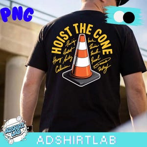 May include: Black t-shirt with the words "HOIST THE CONE" in yellow, surrounding an orange and white traffic cone graphic. The shirt also features several signatures in yellow. The brand name "ADSHIRT LAB" is at the bottom.