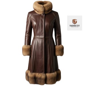 May include: A brown leather coat with fur trim on the collar, cuffs, and hem. The coat has a button closure and a fitted silhouette. The fur is a light brown color, and the leather is a rich, dark brown. The coat is a long, elegant style.