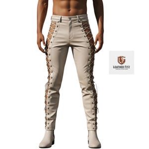 May include: Cream-colored leather pants with lace-up detailing along the sides. The pants have a fitted silhouette and are paired with matching boots. The Leather Fitz logo is visible in the corner.