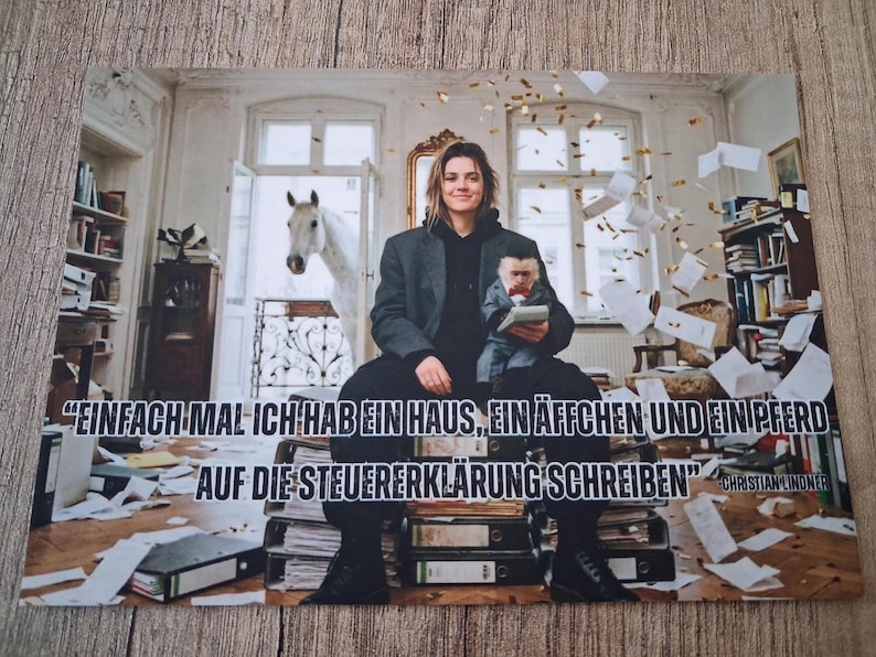 May include: A postcard featuring a person sitting on stacks of files, holding a small figure, with a horse in the background. The image includes text in German. Papers and confetti are scattered around the room.