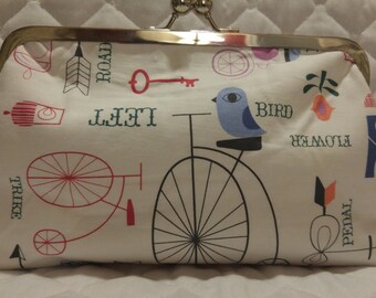 Whimsical bird and bikes clutch