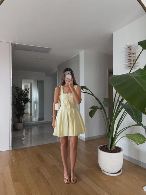 light yellow dress casual Mini Dress, Feminine Summer Outfit, Romantic Cottagecore Style, Elegant Vacation Look, Chic Mini dress Colour:Black Wave chiffonpowderblue With Harper Lu Halter while the relaxed