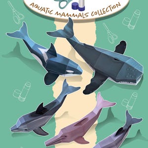 Pode incluir: Ilustração de um conjunto de artesanato em papel com mamíferos aquáticos. A imagem inclui uma orca, uma baleia jubarte e três golfinhos em tons de azul, cinza e rosa. O texto diz "CUT & ASSEMBLE AQUATIC MAMMALS COLLECTION" e "5 FULL COLOR PAPER TOYS."