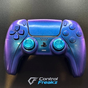 May include: A set of three ceramic mugs with a speckled, matte finish in cream, light grey, and dark grey. Each mug has a simple, minimalist design, suitable for coffee or tea.