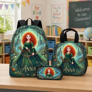 May include: A backpack, lunch bag, and pencil case set featuring a red-haired character in a green dress holding a bow and arrow. The items are decorated with a forest and castle background, with the name ANNA printed in gold script on each piece.