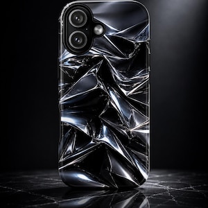 May include: A black smartphone case with a reflective, crumpled metal design. The case features a dual-lens camera cutout at the top. The surface has a glossy, textured appearance, creating a dynamic, abstract pattern. The case is designed to protect the phone.