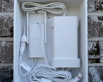 May include: A white rectangular organizer box containing a Govee smart controller and a power adapter. The unit features a white power cord with a connector, a control module with a power button, and a secondary white power brick component.