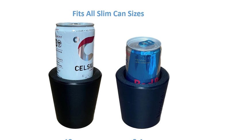 May include: Two black can coolers, each holding a slim can. One cooler holds a Celsius can, the other a Red Bull can. The text "Fits All Slim Can Sizes" is above the coolers. These are designed to keep beverages cold.
