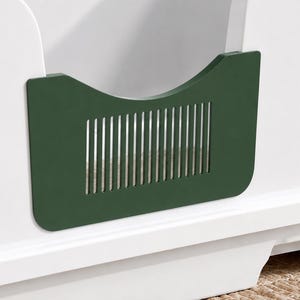 May include: A white enclosure featuring a dark green rectangular panel with a series of vertical slats and a curved top edge. The panel is attached to the front of the white structure, which has a smooth finish and a clean, simple design.