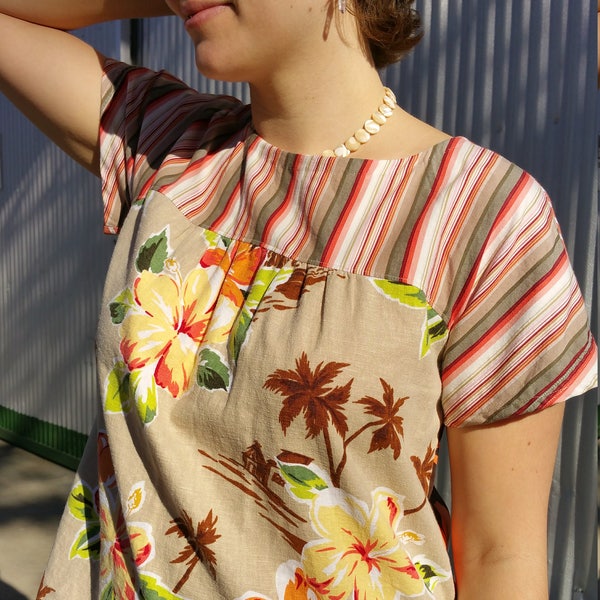Short sleeve blouse of mixed Hawaiian prints and menswear stripes