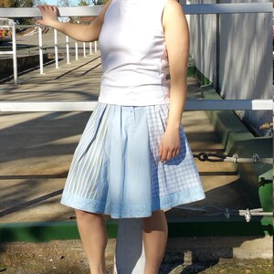 Blue shirt sleeve skirt with blue lace hem