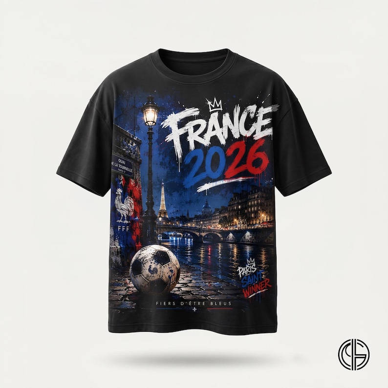 May include: A black short-sleeve t-shirt featuring a graphic print of a Parisian night scene with a soccer ball, the Eiffel Tower, a street lamp, and the text "FRANCE 2026", "PARIS SAINT WINNER", and "FIERS D'ETRE BLEUS" with a rooster emblem.