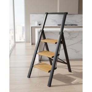 May include: A black folding step stool with three wooden steps. The step stool is designed for indoor use and has a simple, modern aesthetic. The steps are made of light-colored wood.