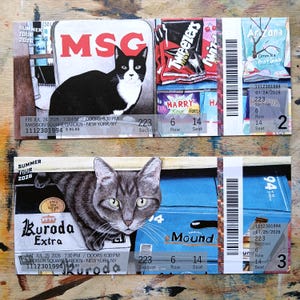 May include: Two rectangular event tickets for a 2026 Summer Tour at Madison Square Garden. The top ticket features a black and white cat, snack packaging, and text reading MSG. The bottom ticket shows a tabby cat, Kuroda Extra text, and a barcode.