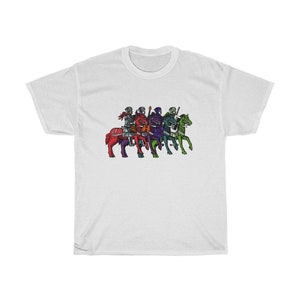 May include: A white t-shirt with a colorful illustration of four knights on horseback. The knights are wearing armor and riding horses in a line. The horses are red, green, purple, and blue.