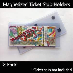 May include: Two clear plastic ticket stub holders with magnets. The holders are designed to hold a concert ticket stub. The ticket stub is not included. The text on the ticket stub reads "Summer Tour 2024" and "GA Lawn".
