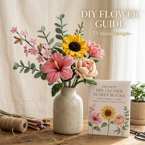 May include: A handmade flower arrangement in a speckled vase, featuring a vibrant mix of pink hibiscus, yellow sunflowers, and peach-colored peonies. The arrangement is accompanied by a DIY guide titled "Aesthetic Pipe Cleaner Flower Bundle".