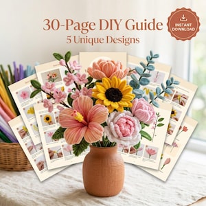 May include: A terracotta vase holds a vibrant bouquet of handmade fabric flowers, including a hibiscus, sunflower, and peony. The arrangement is set against a backdrop of a 30-page DIY guide with 5 unique designs, offering an instant download.