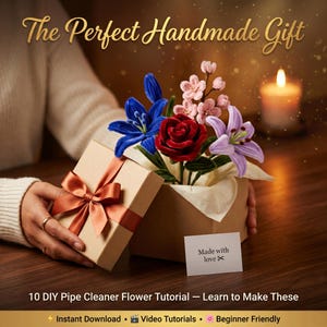 May include: A handmade gift box with a satin ribbon bow, containing colorful pipe cleaner flowers. The flowers include blue lilies, a red rose, pink blossoms, and purple lilies. The text reads "The Perfect Handmade Gift".