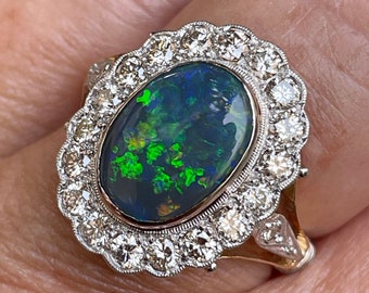 An exquisite 2.25ct Authentic Antique Art Deco Black Opal and Diamond Cluster Cocktail 18K Gold Ring