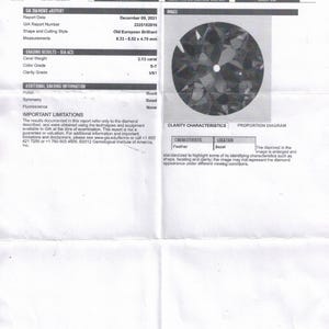 May include: A GIA eReport document detailing a diamond's characteristics. The report includes the date, report number, shape, cutting style, and measurements of the diamond. The diamond is an Old European Brilliant, measuring 8.33-8.52 x 4.79 mm, with a carat weight of 2.13.