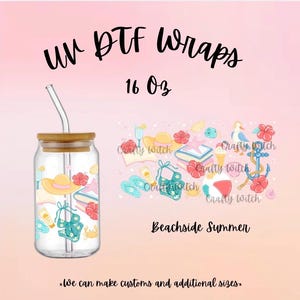 May include: A clear glass tumbler with a bamboo lid and a glass straw. The tumbler is decorated with a beach-themed design, including a swimsuit, hat, and flowers. The text "UV DTF Wraps" and "16 oz" are displayed on the image, along with "Beachside Summer".