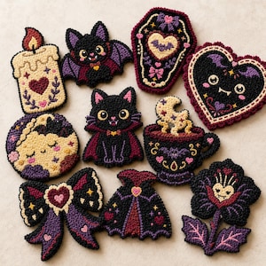 May include: A collection of ten embroidered patches featuring various designs including a candle, a bat, a coffin, a heart, a moon, a cat, a teacup, a bow, a cape, and a flower, all rendered in a palette of black, purple, red, and cream.