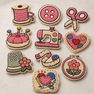 May include: A collection of ten punch needle patches featuring sewing-themed designs including a pink thread spool, a button, scissors, a pincushion, a sewing machine, a heart, a thimble, a measuring tape, an embroidery hoop, and a craft kit.