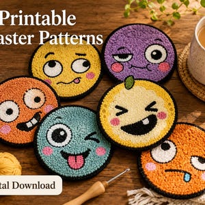 May include: A set of emoji-faced coasters in yellow, orange, purple, and teal, with black outlines and pink accents. The image shows a cup of tea and yarn balls. Text reads "10 Printable Coaster Patterns" and "Digital Download".