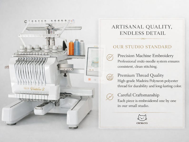 May include: A white Venture 2 embroidery machine with multiple thread spools in orange, blue, and light blue. The image includes text that reads "Artisanal Quality, Endless Detail" and "Precision Machine Embroidery".