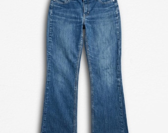 Jeans Riders by Lee para mujer, talla 6, corte bota, lavado medio, cintura sin abertura, estilo vaquero Y2K.