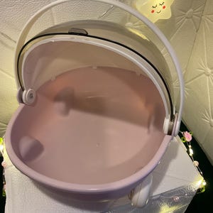 May include: A set of three ceramic mugs with a speckled, matte finish. The mugs are in shades of cream, light gray, and dark gray. Each mug has a simple, minimalist design and a rounded handle.