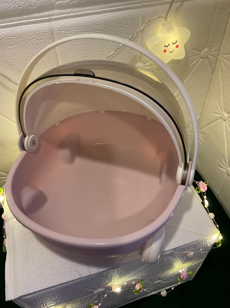 May include: A set of three ceramic mugs with a speckled, matte finish. The mugs are in shades of cream, light gray, and dark gray. Each mug has a simple, minimalist design and a rounded handle.