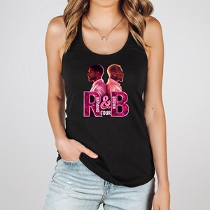May include: Black tank top featuring a graphic with two men's profiles and the text "R & B TOUR" in pink and purple. The tank top is a racerback style.