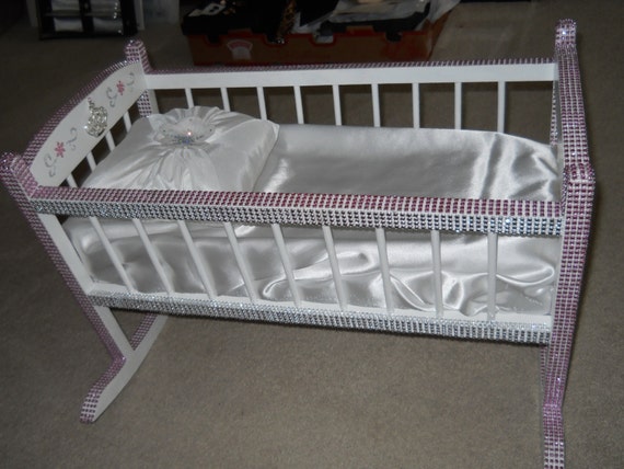baby doll and crib
