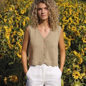 May include: A set of three ceramic nesting bowls in shades of blue, green, and white. The bowls feature a speckled glaze and a simple, modern design. The largest bowl measures approximately 6 inches in diameter.