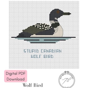 May include: A cross-stitch pattern of a bird, with the text "STUPID CANADIAN WOLF BIRD". The bird is depicted in shades of black, gray, and white, with a light blue water line. The words "Digital PDF Download" and "Wolf Bird" are also present.