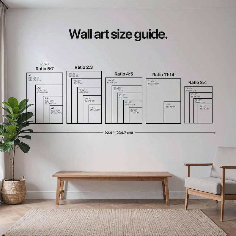 May include: A wall art size guide with various aspect ratios and dimensions in inches and centimeters. The guide includes ratios like 5:7, 2:3, 4:5, 11:14, and 3:4, with corresponding sizes. The text "Wall art size guide" is at the top. A wooden bench and chair are in the foreground.