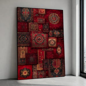May include: A large framed artwork featuring a collage of intricately patterned rugs in shades of red, gold, and black. The design incorporates various shapes and sizes, creating a visually rich and textured composition. The artwork is displayed against a neutral wall.