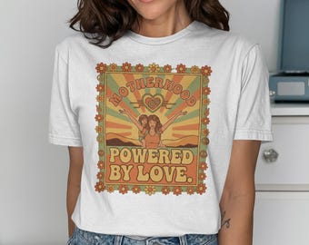 Motherhood Powered by Love T-Shirt | Retro 70s Groovy Mom Life Tee