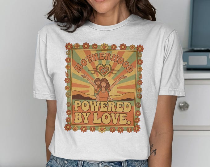 Motherhood Powered by Love T-Shirt | Retro 70s Groovy Mom Life Tee