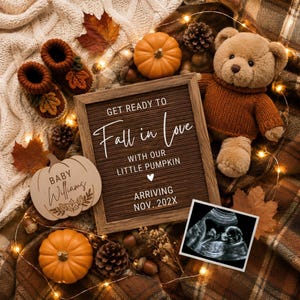 May include: A brown felt letter board with the text GET READY TO Fall in Love WITH OUR LITTLE PUMPKIN ARRIVING NOV. 202X, a tan teddy bear, two orange pumpkins, a pair of brown knit baby booties, a wooden pumpkin sign, and an ultrasound scan.