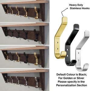 May include: A wall-mounted wooden shelf with five heavy duty stainless hooks. The hooks are available in gold, black, and silver finishes. The text reads: Heavy Duty Stainless Hooks and Default Colour is Black; For Golden or Silver Please specify in the Personalization Section.