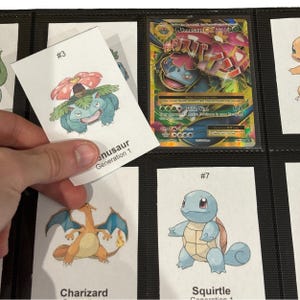May include: A collection of Pok&eacute;mon cards in a black binder. One card is being held up, showing a drawing of a Venusaur. Other cards feature Charizard and Squirtle. A Venusaur EX card is also visible.