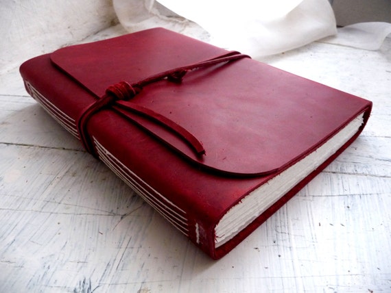 Large Red Leather journal measures 16cm by 21.5cm