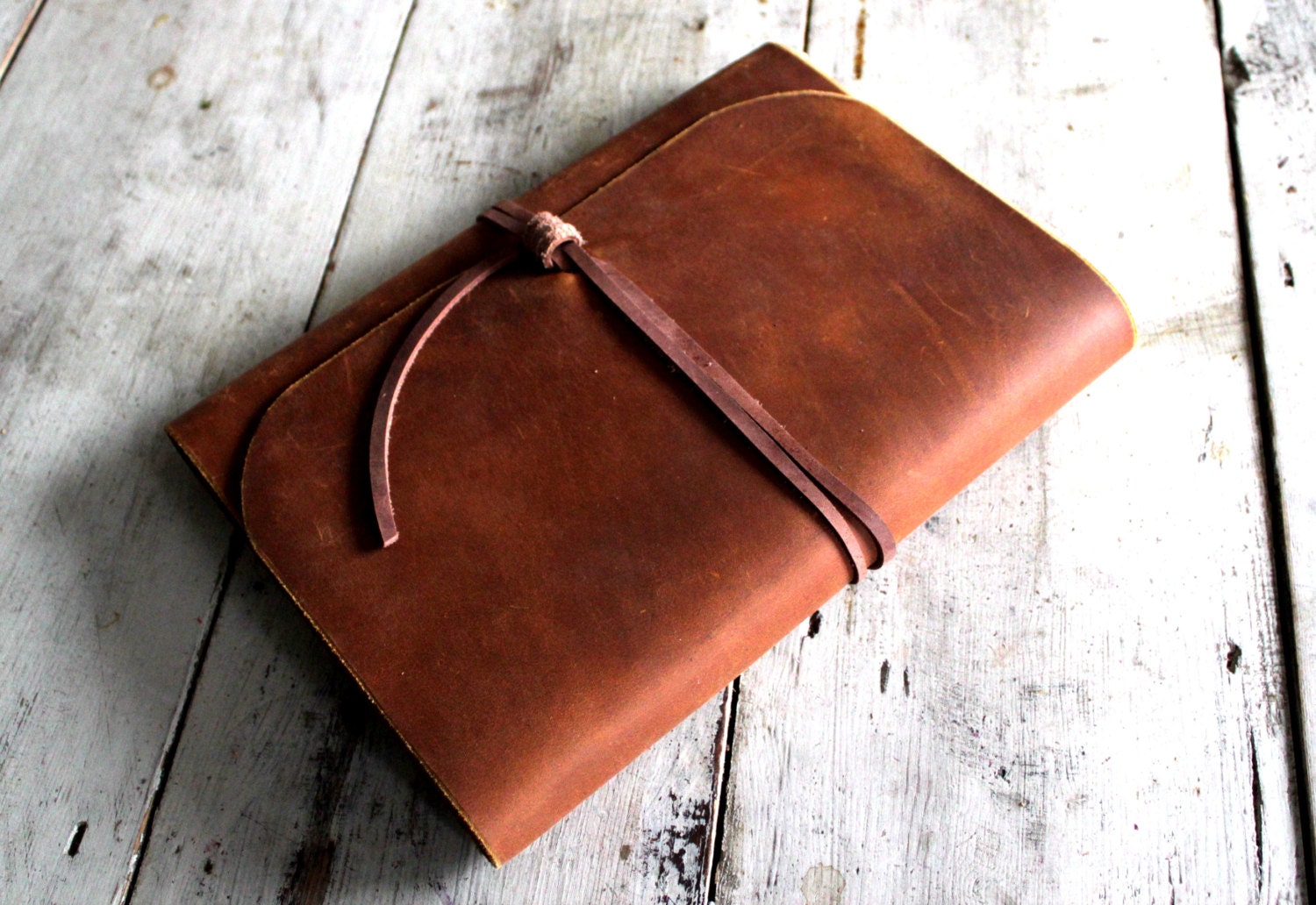 5 leather book covers and pipe pouch