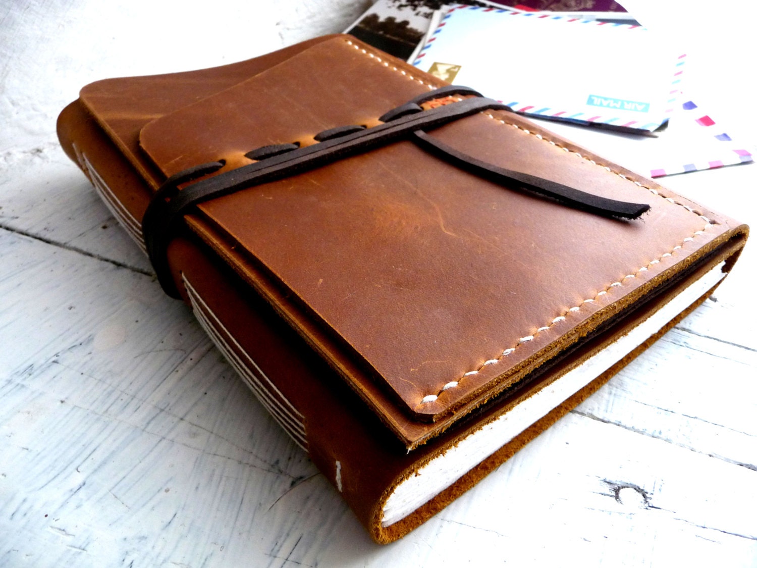 Large leather travel journal with inside and outside