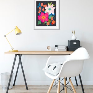 May include: A framed print of a colorful floral illustration on a black background. The flowers are pink, white, and blue with green leaves.