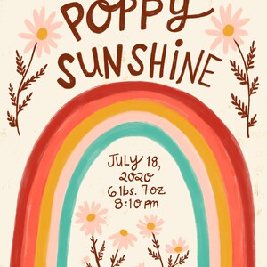 May include: A whimsical illustration with the words "POPPY SUNSHINE" in brown script above a rainbow. Below the rainbow are the birth details: July 18, 2020, 6 lbs. 7 oz, 8:10 pm. The design includes daisies and floral accents.