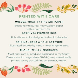 May include: A rectangular informational card with a scalloped white border on a light peach background featuring strawberry and botanical illustrations. The text reads: PRINTED WITH CARE, MUSEUM-QUALITY FINE ART PAPER, ARCHIVAL PIGMENT INKS, ORIGINAL DREAM FOLK ARTWORK, THOUGHTFULLY PRODUCED. It mentions production in a South Dakota studio and 18x24 inch sizes.